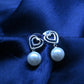 GehnaBuzz Mesmerizing Heart in Heart Pearl Earring