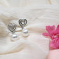 GehnaBuzz Mesmerizing Heart in Heart Pearl Earring